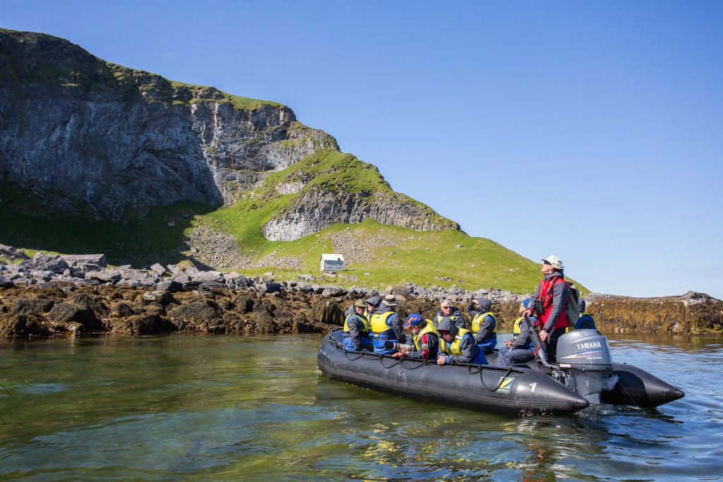 Zodiac cruising Norway's coastline with Aurora Expeditions
